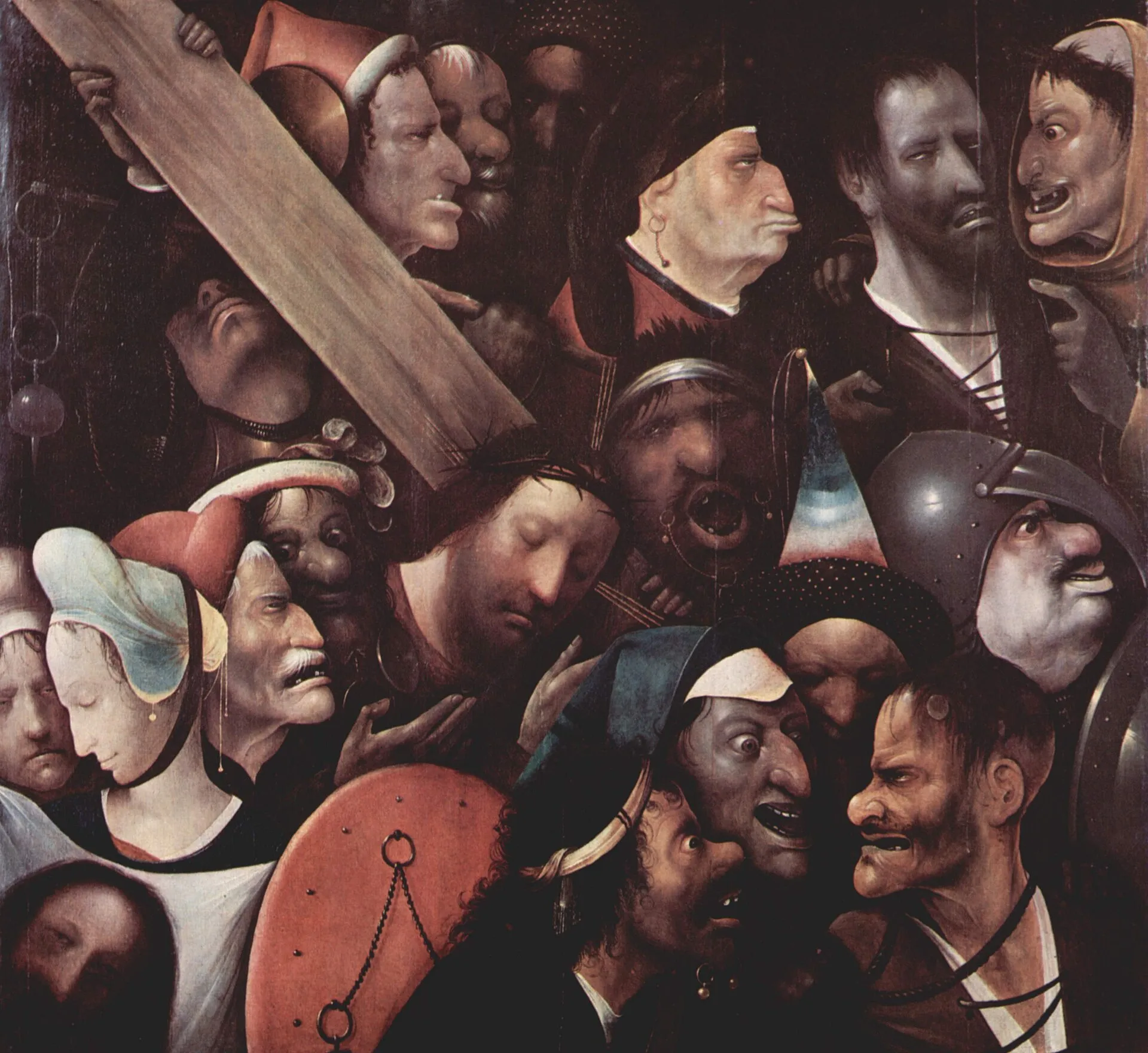 Christ surrounded by deformed faces that fill the whole panel.